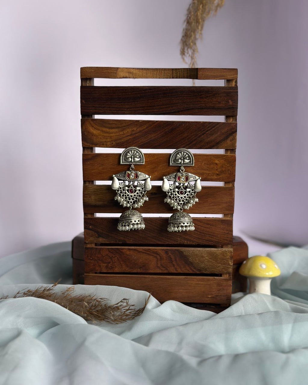 TAARA kundan brass jhumka earrings