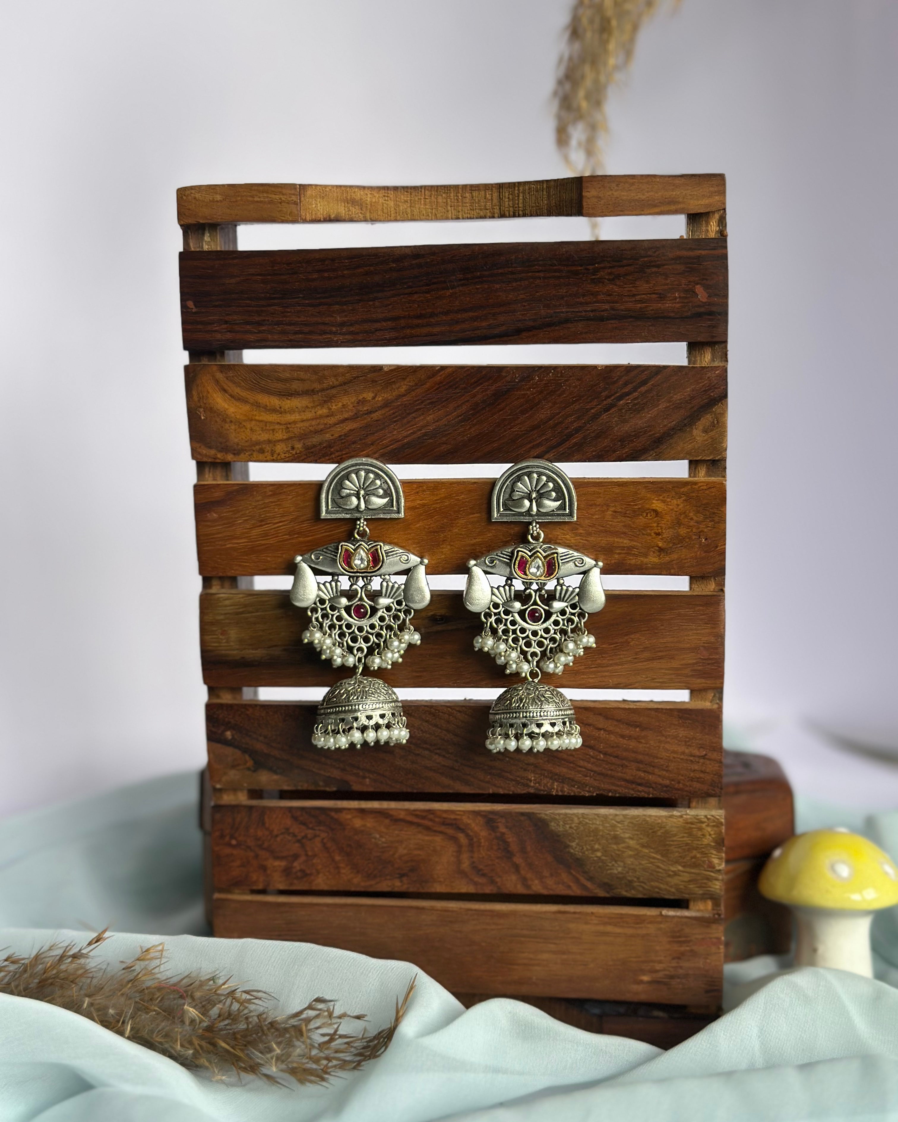TAARA kundan brass jhumka earrings